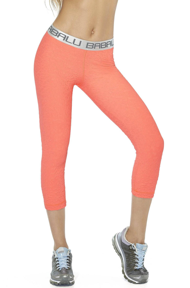 Fun, cute coral ⅞ leggings with silver waist band 